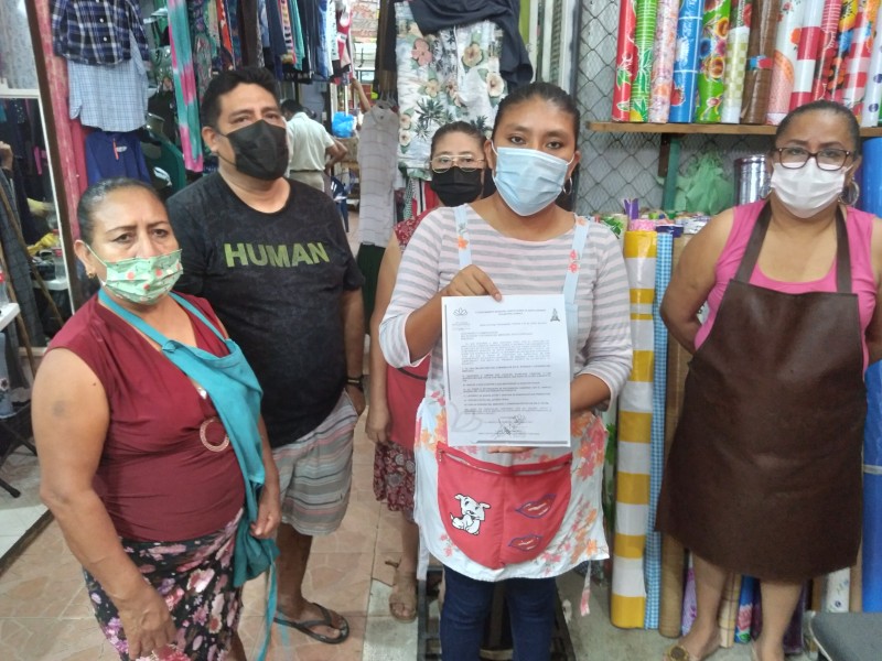 Locatarios acatarán medidas sanitarias por cambio de semaforización en Tehuantepec