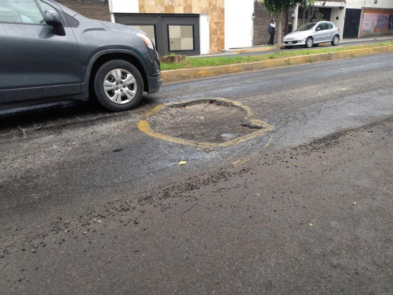 Afectaciones por baches en vehículos aumenta por lluvias