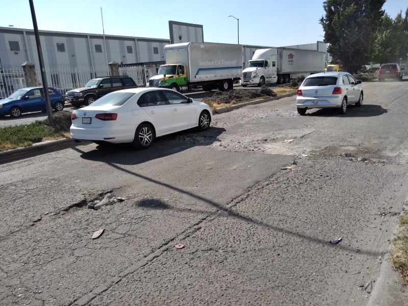 Baches y coladeras en Parque Industrial Doña Rosa