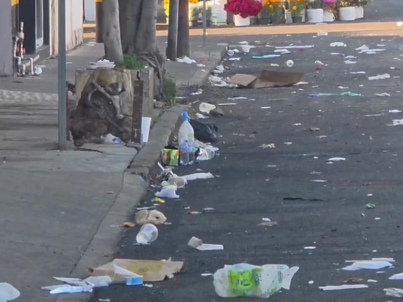 Basura invade la 25 Sur tras festejos a San Judas