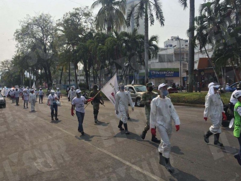 Brigadistas marchan en Acapulco, invitan a quedarse en casa