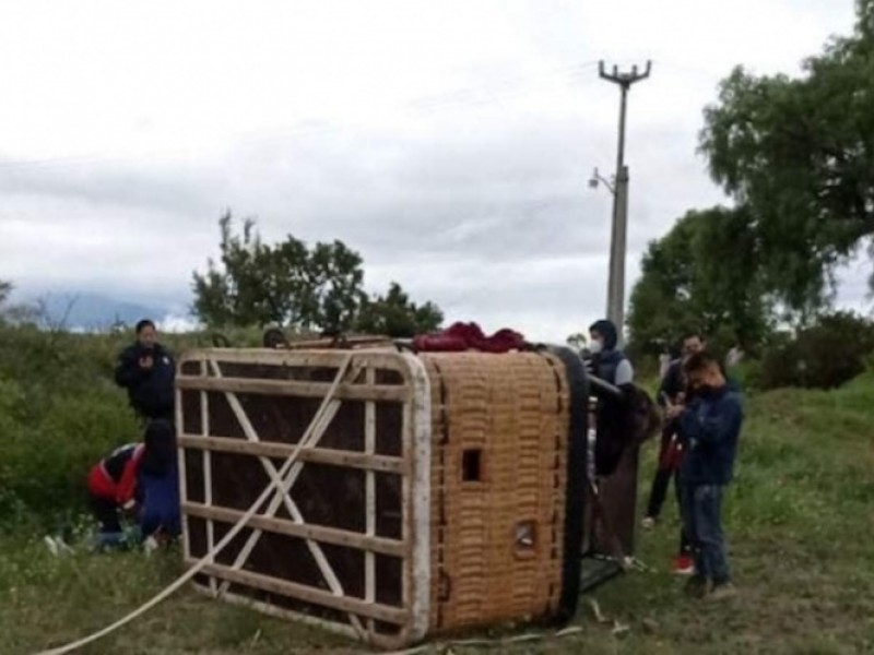 Cae globo aerostático; niña resulta lesionada