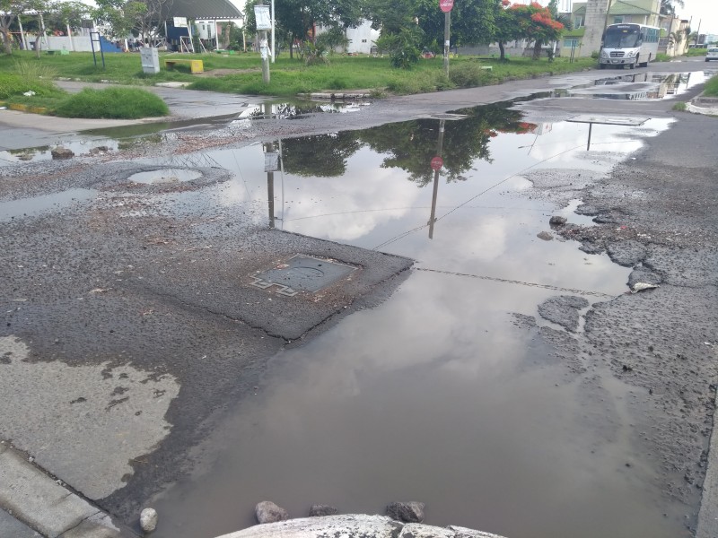 Calle de Arboledas San Ramón en malas condiciones