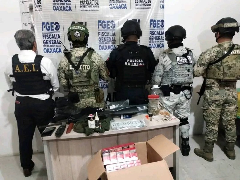 Catean inmueble en Huatulco y aseguran armas, vehículos y joyas