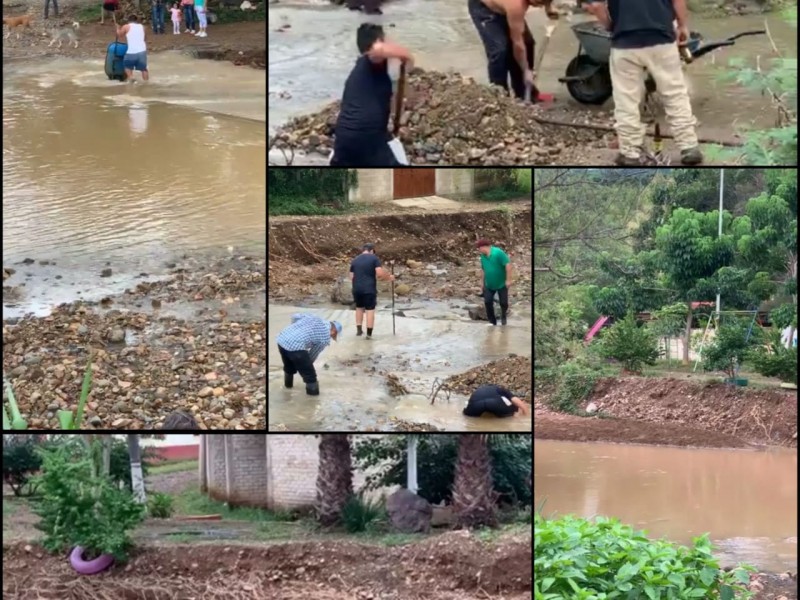 Compostelenses toman iniciativa en desazolve de arroyo en Mazatán