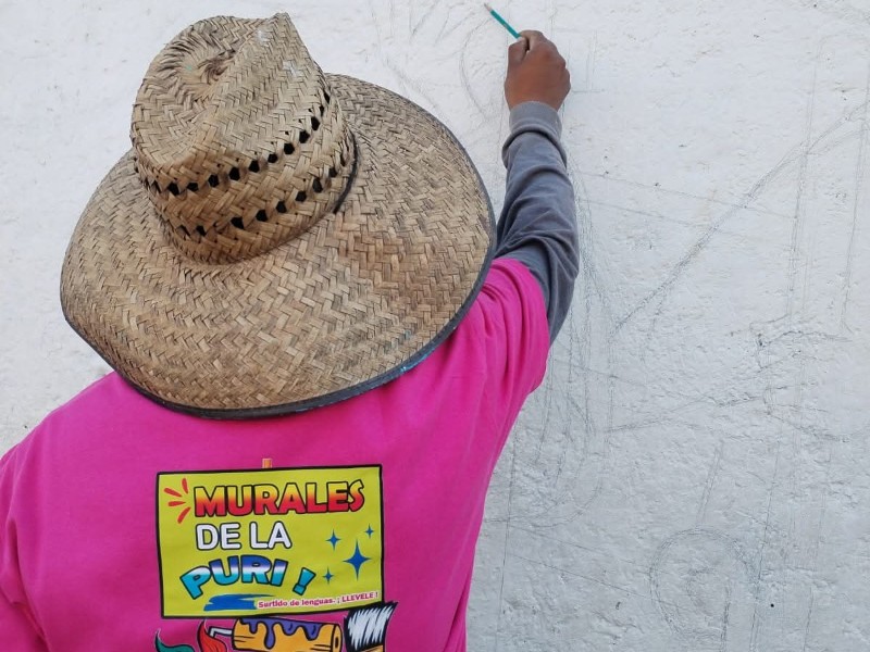 Con murales comunitarios en 