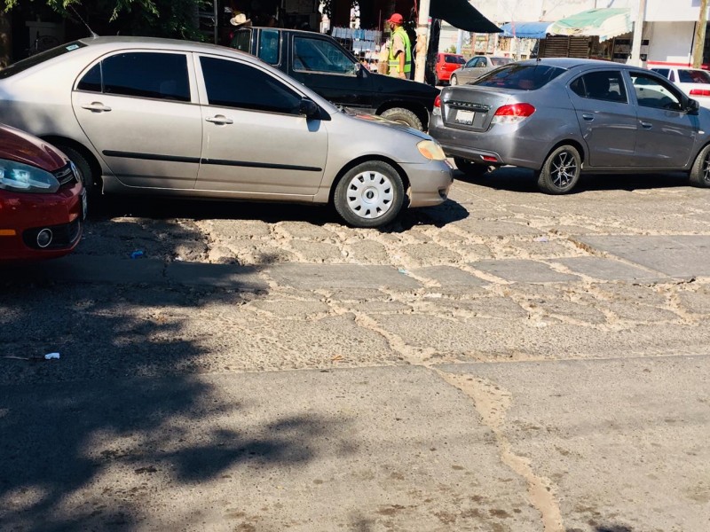 Conductores se quejan de baches en Sector Centro