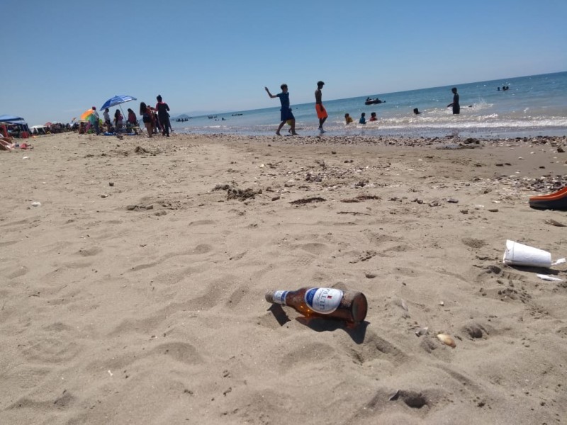 Continúan botellas de vidrio en las playas