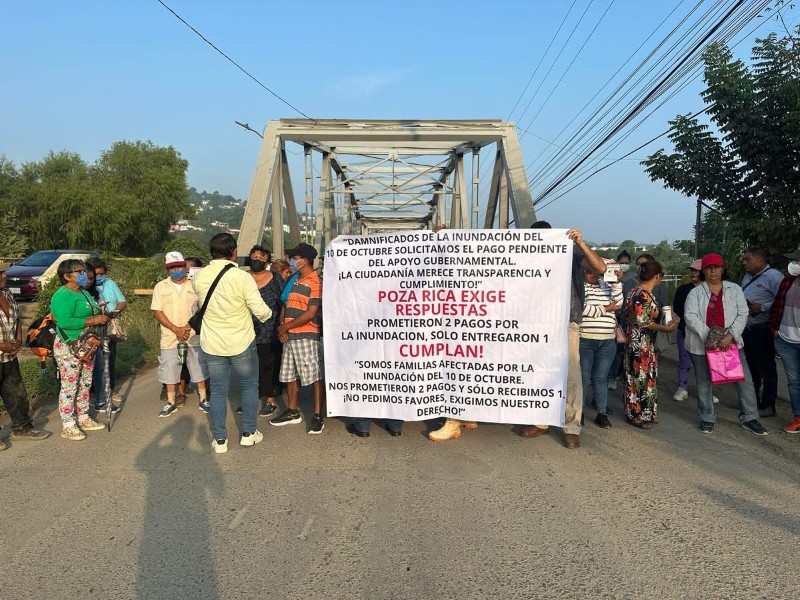 Damnificados bloquean puente Cazones 1: Exigen segundo apoyo de Bienestar