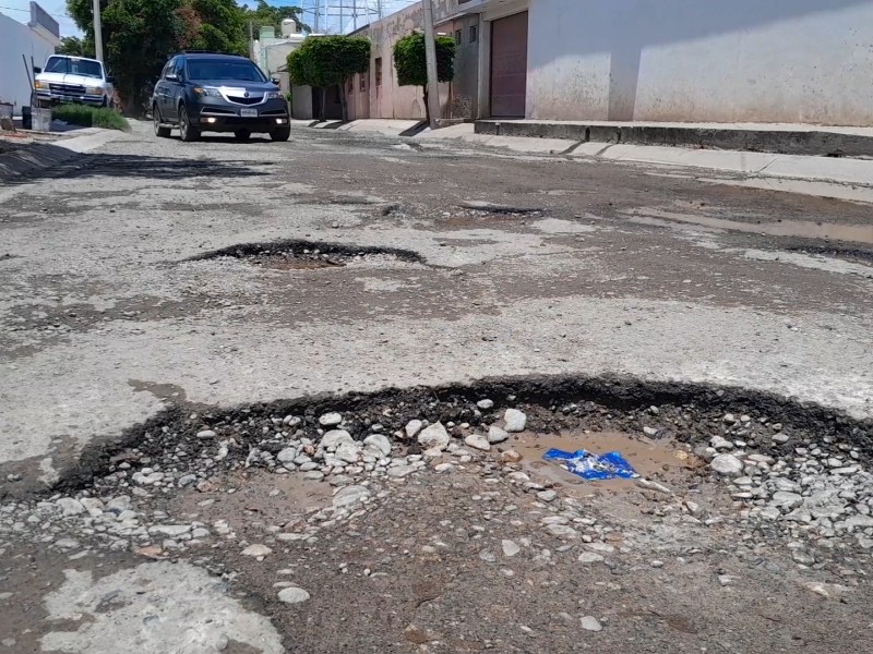 Daños en vehículos por baches, hoyo al bolsillo de ciudadanos