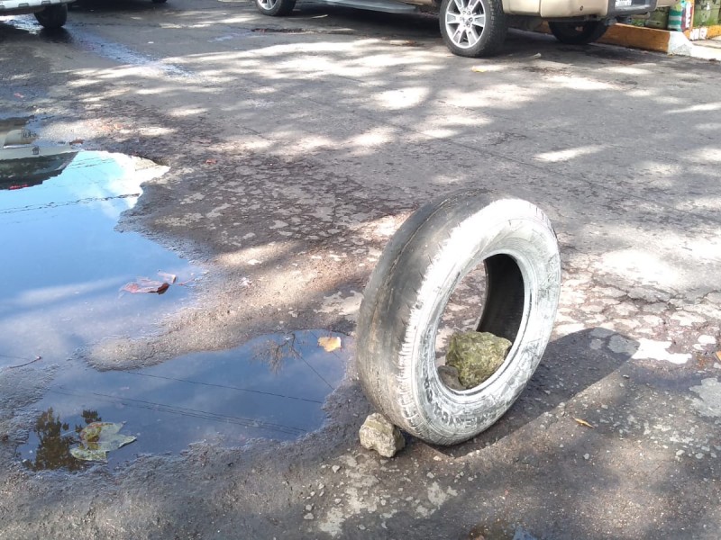 Denuncian baches en avenidas Américas y Ferrocaril Interoceánico