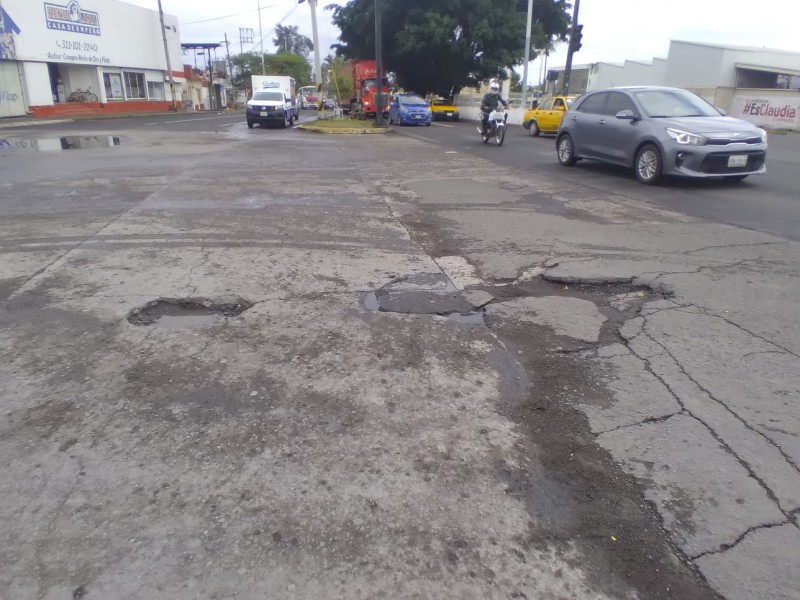 Denuncian baches en intersección Ixtlán y Av. Insurgentes