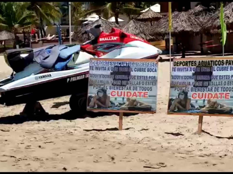 Deportes Acuáticos colocan en playas letreros para fomentar usar cubrebocas