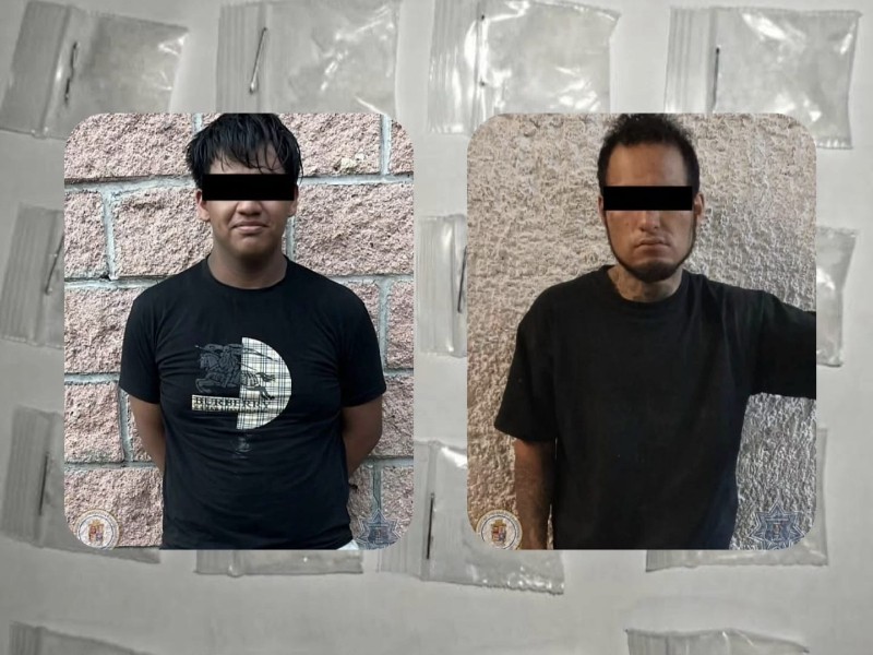 Detienen a dos hombres armados con droga tras persecución