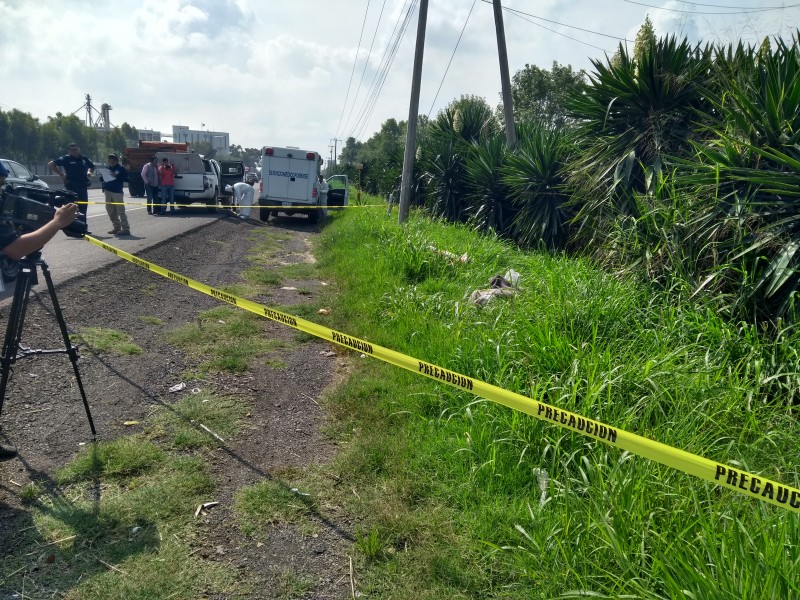 Encuentran cadáver en un costal