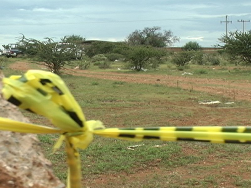 Encuentran dos cuerpos dentro de noria