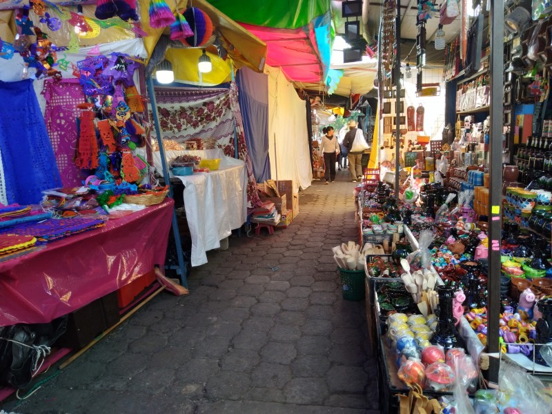 Entre colores, aromas y texturas corredor de Día de Muertos