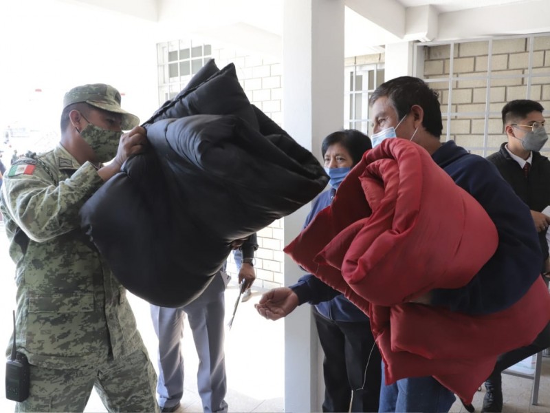 Entregan despenas a los afectados por la explosión en Xochimehuacan