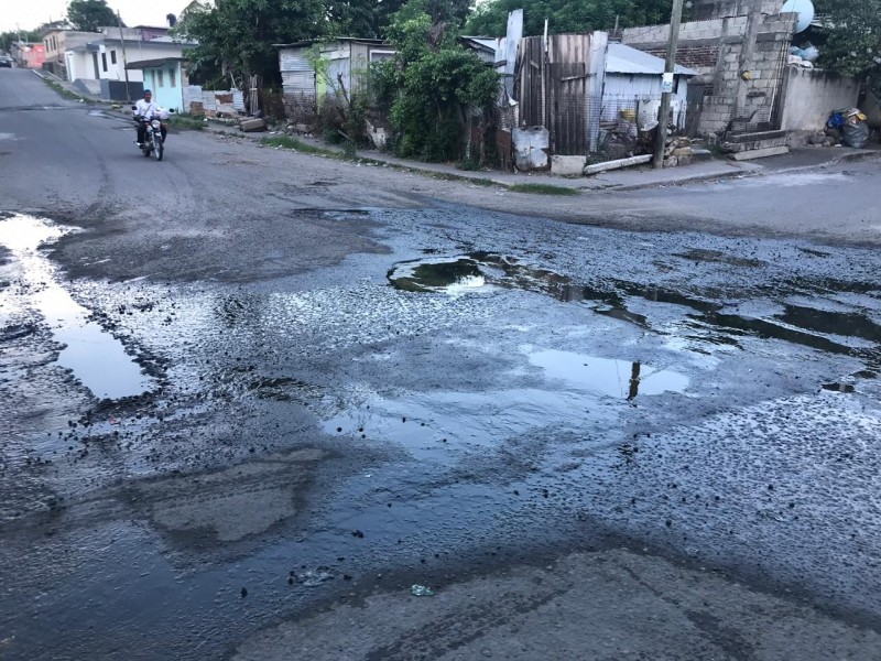 Fuga de aguas negras en la Miguel Hidalgo