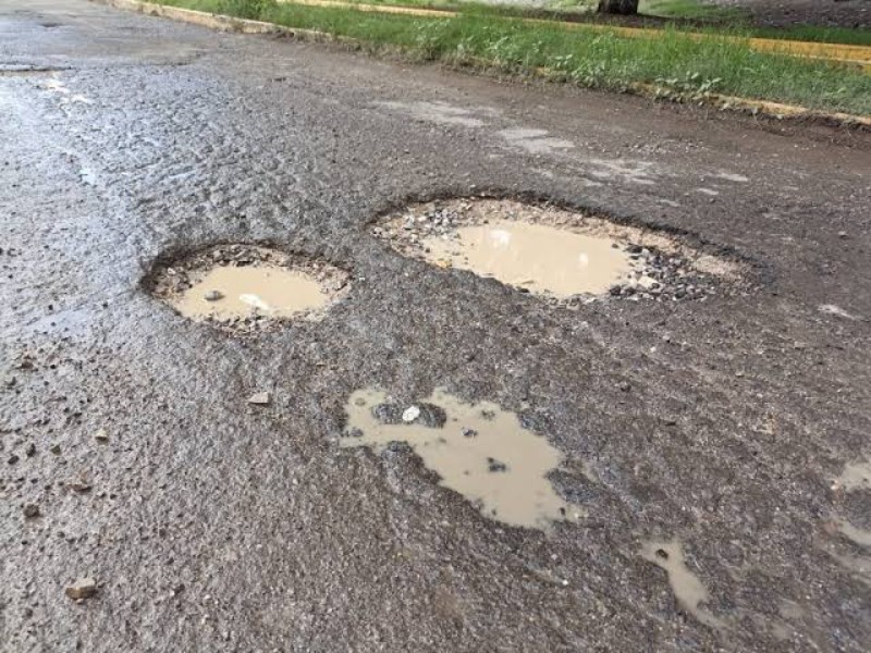 Gobierno buscará arreglar los baches en Puebla Capital