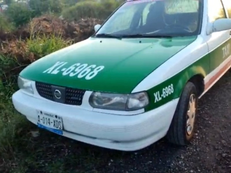 Hallan sin vida a taxista en Tabachines