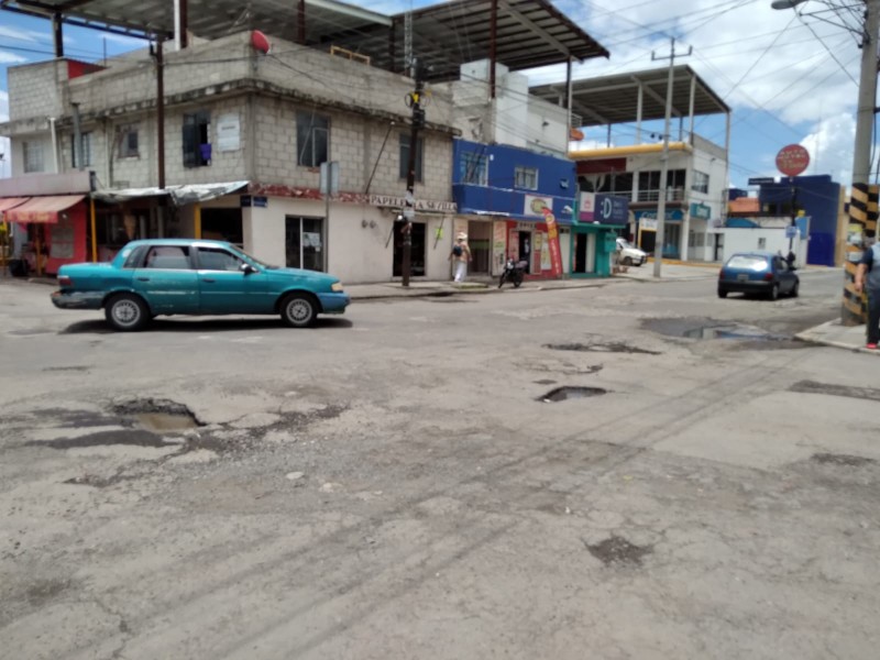 Hoyos y baches en calles de San Francisco Mayorazgo