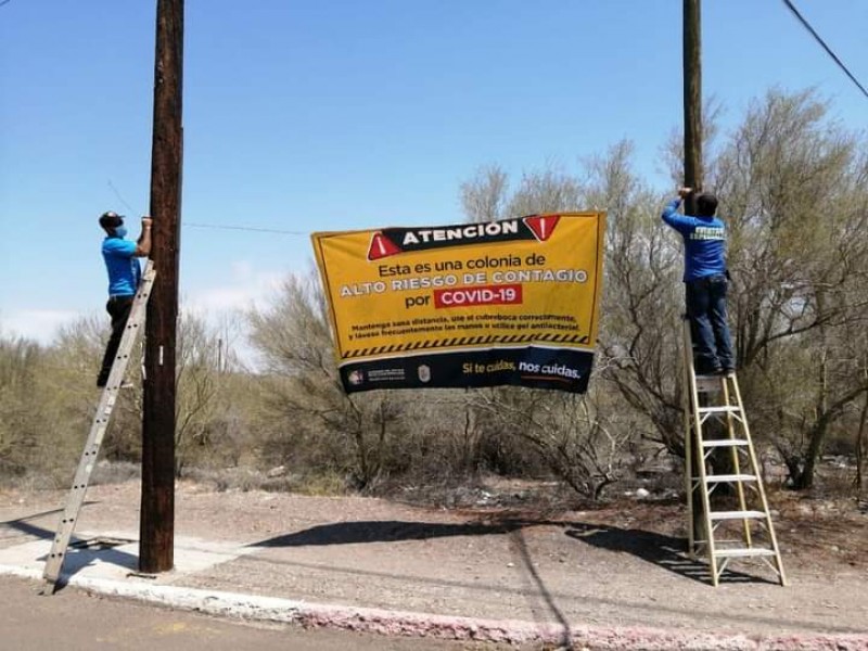 Instalan lonas para advertir de zonas de riesgo por covid-19