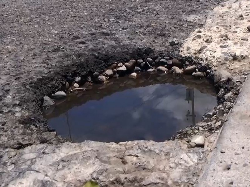 La calle con más baches de Culiacán