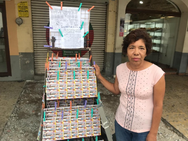 Le roban puesto a vendedora de billete Lotería