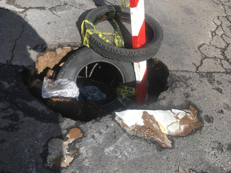 Lluvias generan baches en la colonia San Felipe