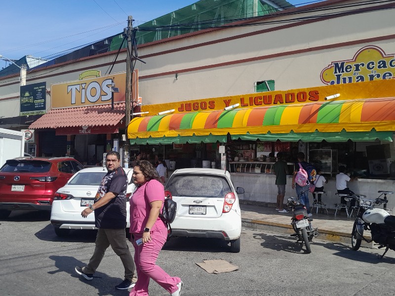 Locatarios del Miguel Hidalgo piden orden en estacionamiento y obras