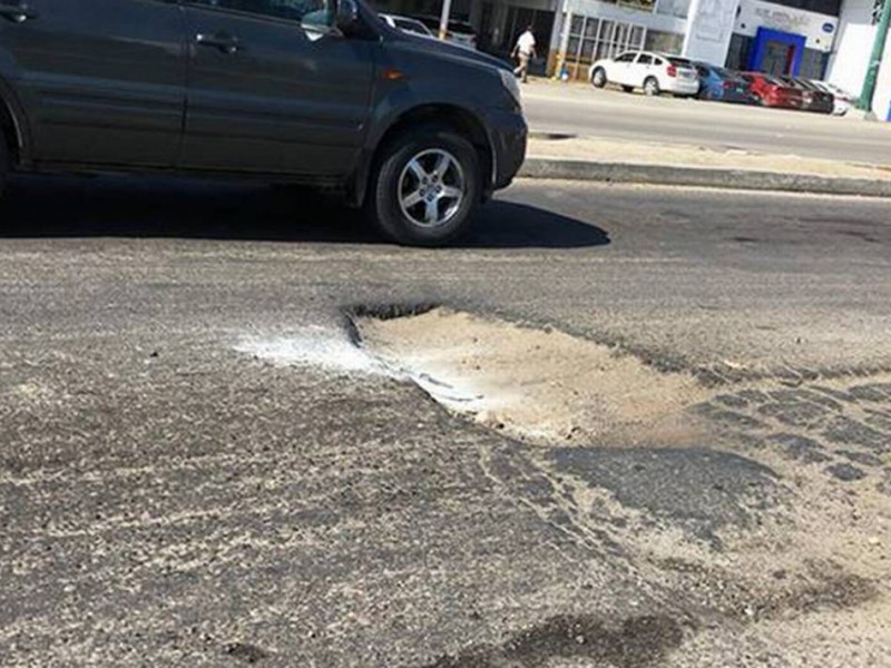 Los baches: el terror para automovilistas