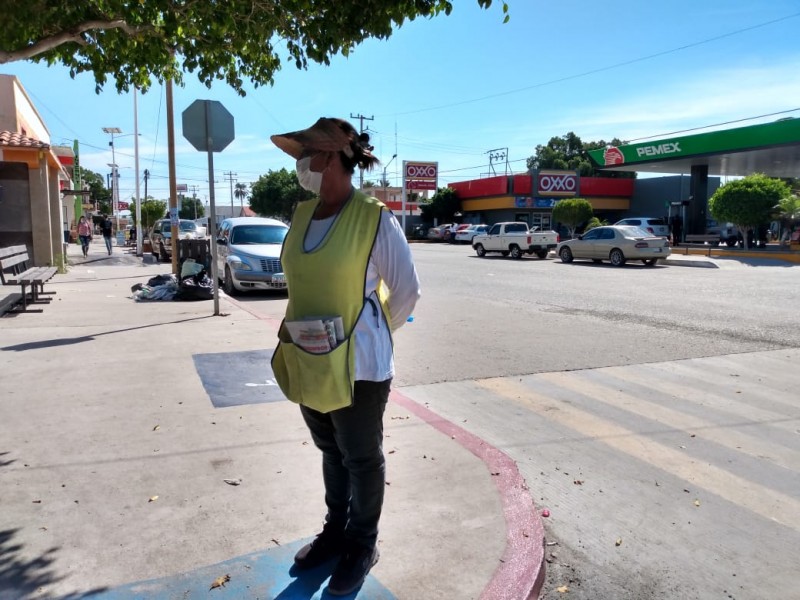 Mujeres con sobrecarga laboral con empleo y labores del hogar