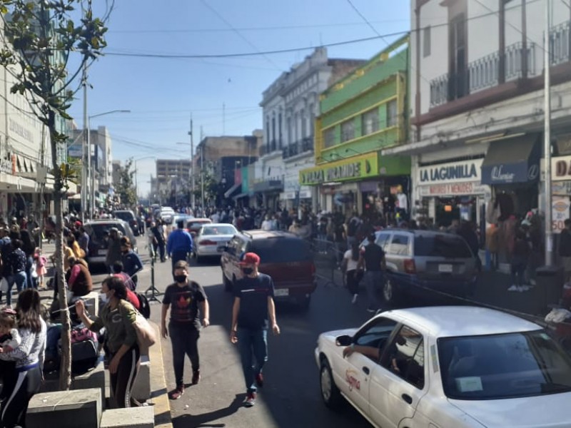 Pese a afluencia en Obregón, comerciantes reportan bajas ventas