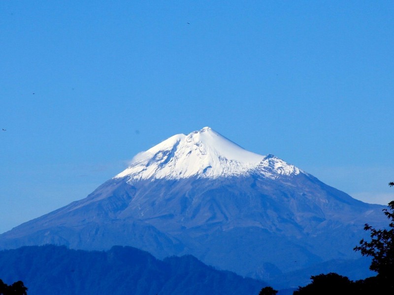 Pico de Orizaba está entre Veracruz y Puebla, aclara INEGI