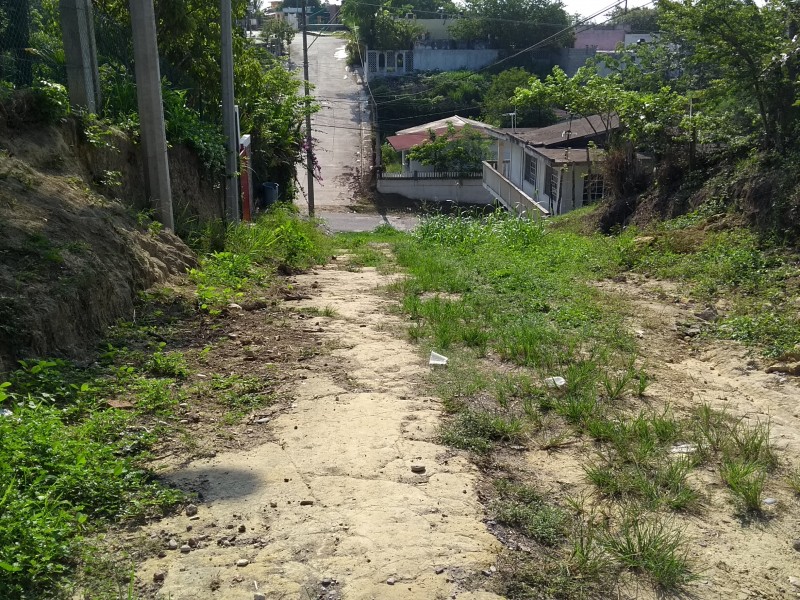 Urgen rehabilitación de calle en colonia El Romance