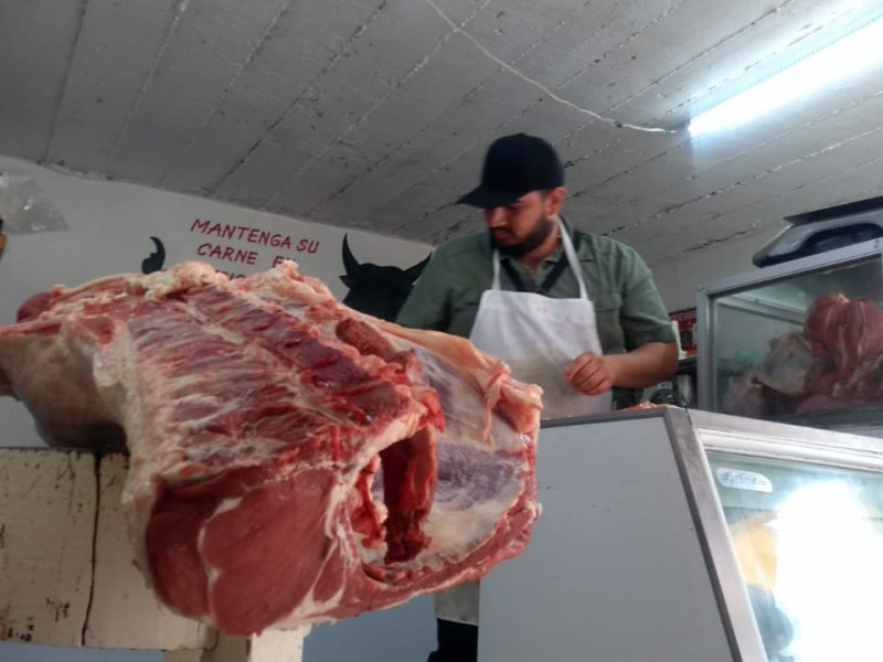 Prefieren la carne de puerco por economía.