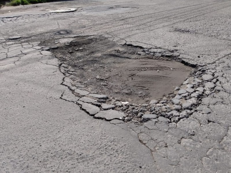 Problemas de baches en Arboledas de Loma Bella