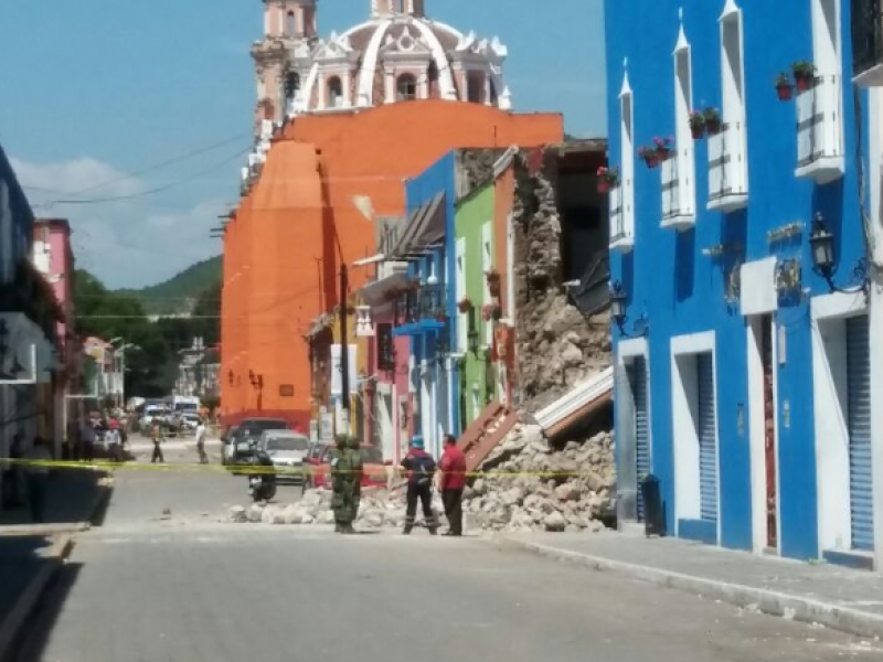 Lenta, reconstrucción de iglesias en Atlixco