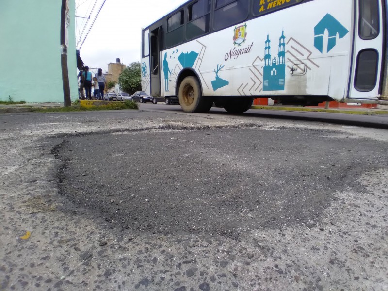 Tapan bache dejado por obras hidráulicas, en calle Pedraza