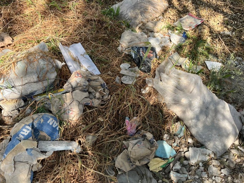 Reportan basura en terreno de la colonia Killian II
