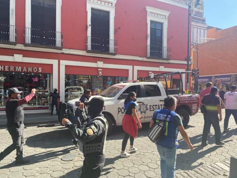 Se enfrentan comerciantes del Centro Histórico de Puebla