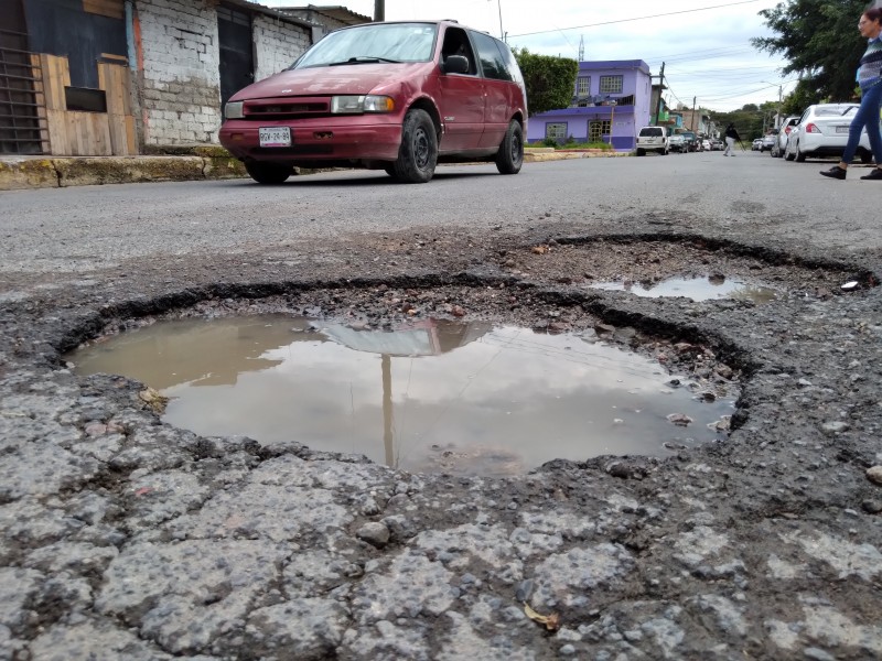 SIAPA responsable de baches en la calle 21 de agosto