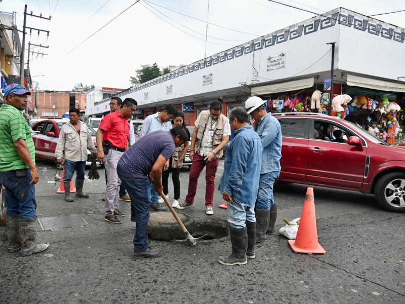 Siguen retirando basura y llantas de los drenes pluviales