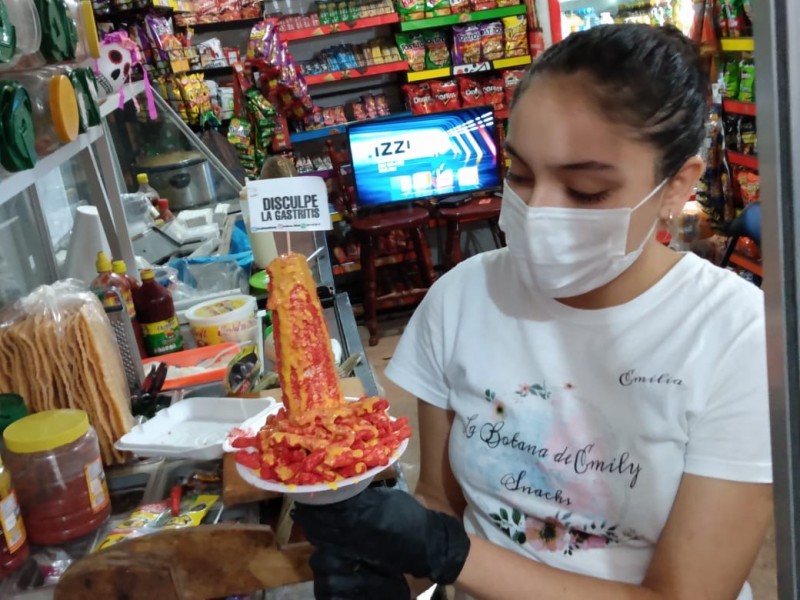 Snacks cubiertos de queso y amor, un favorito gusto culposo