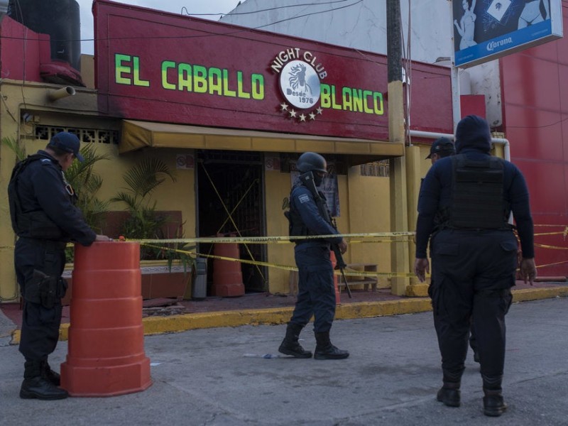 Suman 29 muertos por la masacre en bar