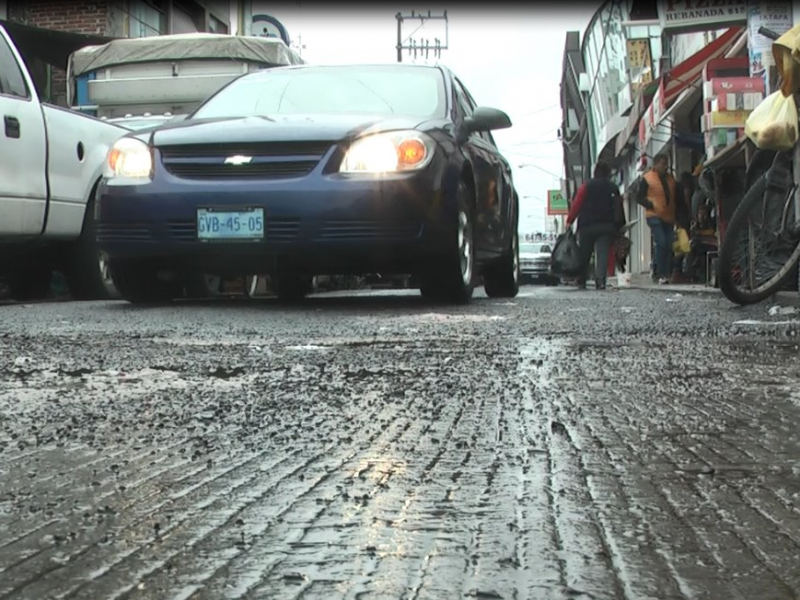 Tapan baches en la Sánchez Torrado