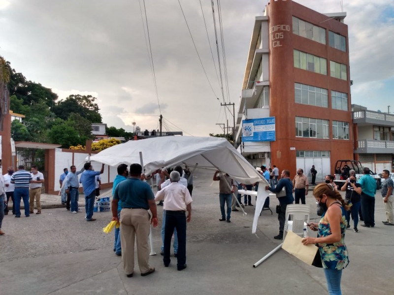 Taxistas levantan bloqueo bajo promesa de conciliación