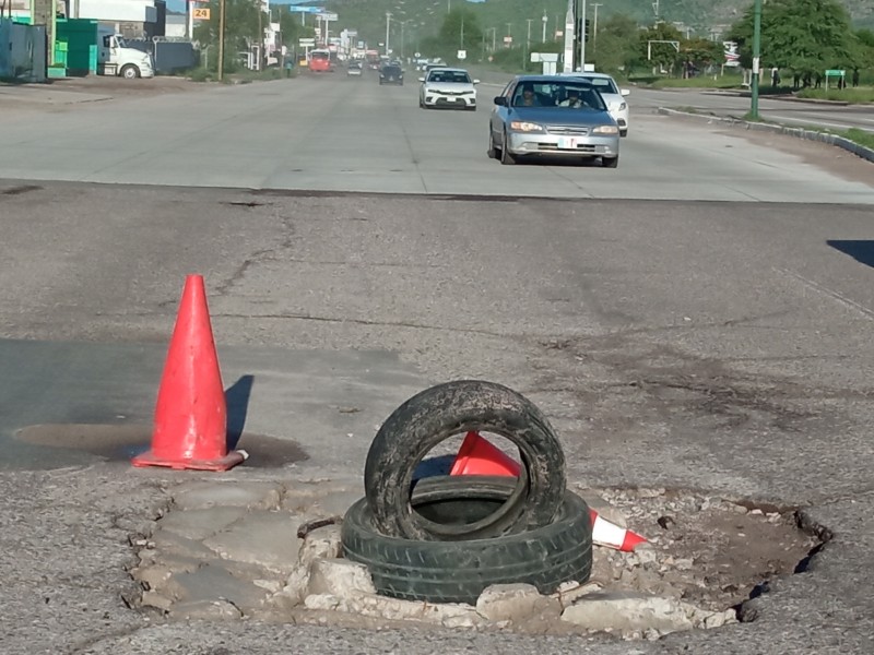 Una trampa representa alcantarilla destrozada por lluvia