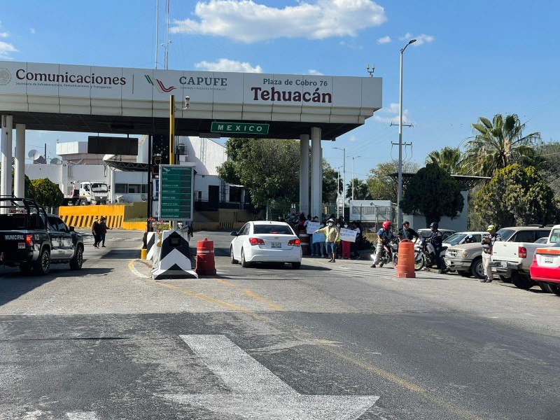 Vecinos de San Lorenzo toman la caseta de la Cuacnopalan-Oaxaca